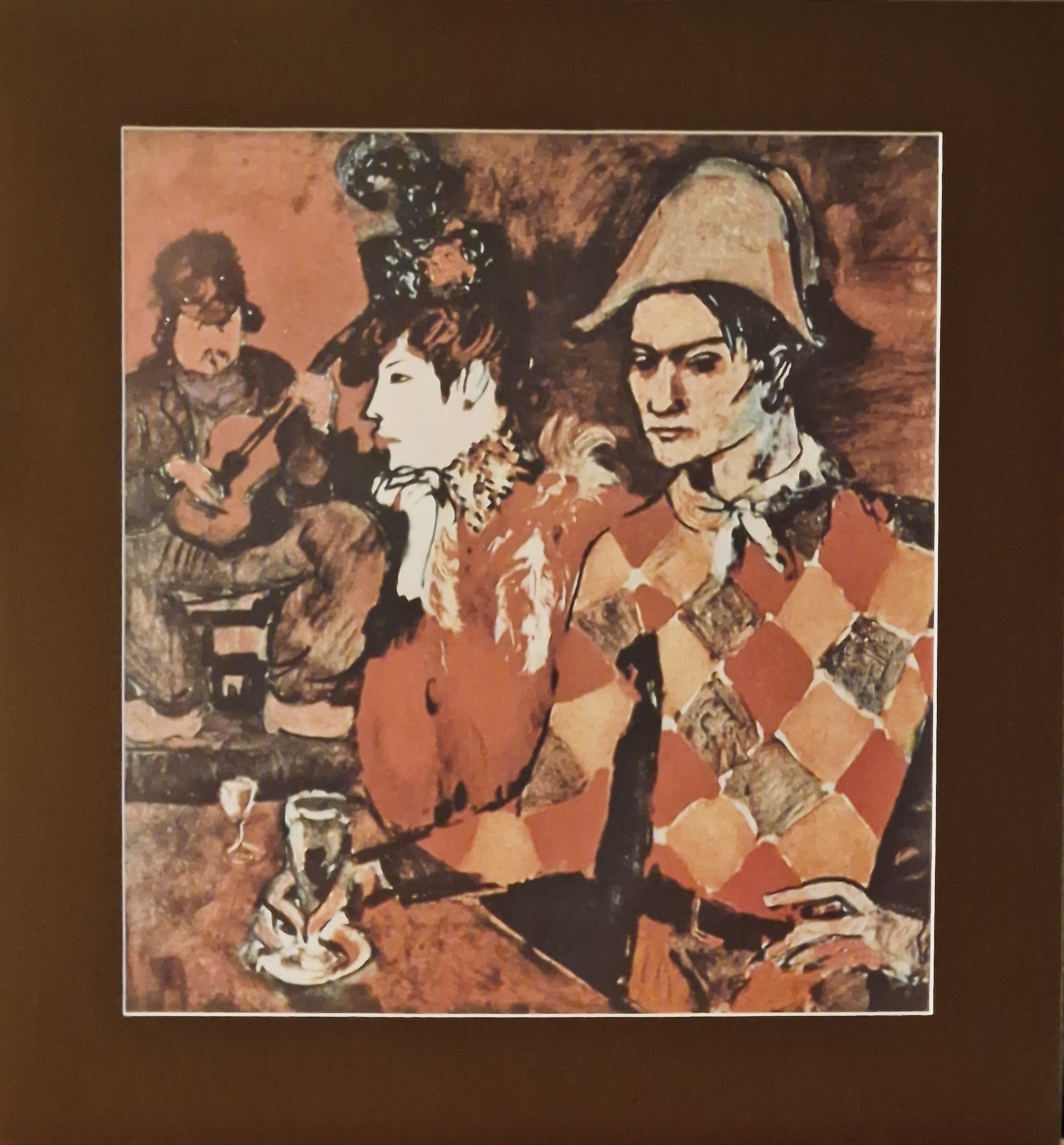 Pablo Picasso (1881-1973) Self-portrait as a Harlequin in the café
